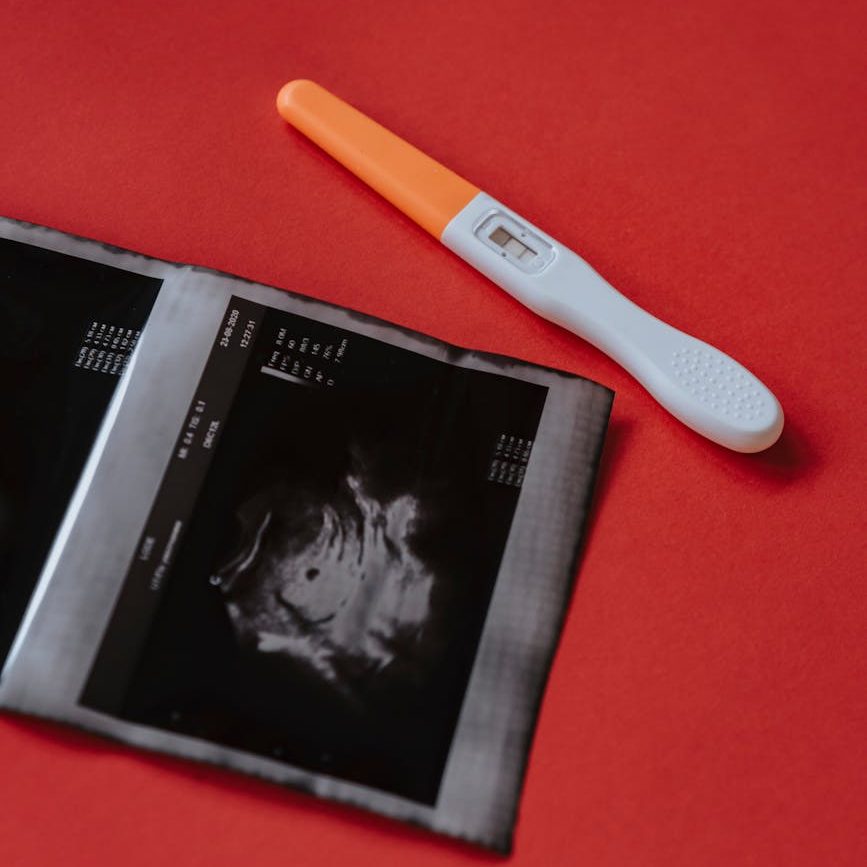 A positive pregnancy test and a fuzzy ultrasound image.